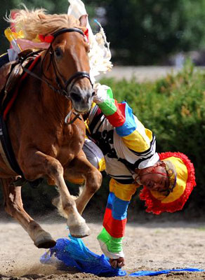 The farmers and herdsmen take part in the horse racing game during the Shoton Festival, Aug 11.