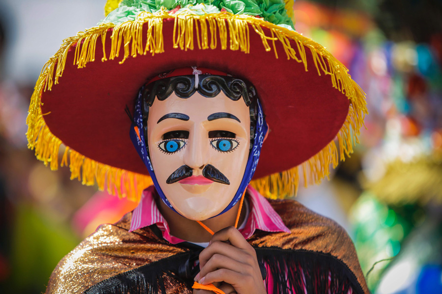 A dancer performs traditional dances during San Sebastian festivity in Diriamba, province of Carazo, some 50 km south of Managua, the capital of Nicaragua, on January 19, 2016. [Photo/CFP]