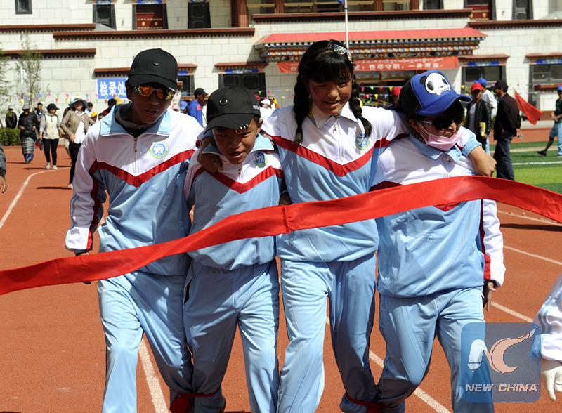 School sheds light on Tibet's special needs children