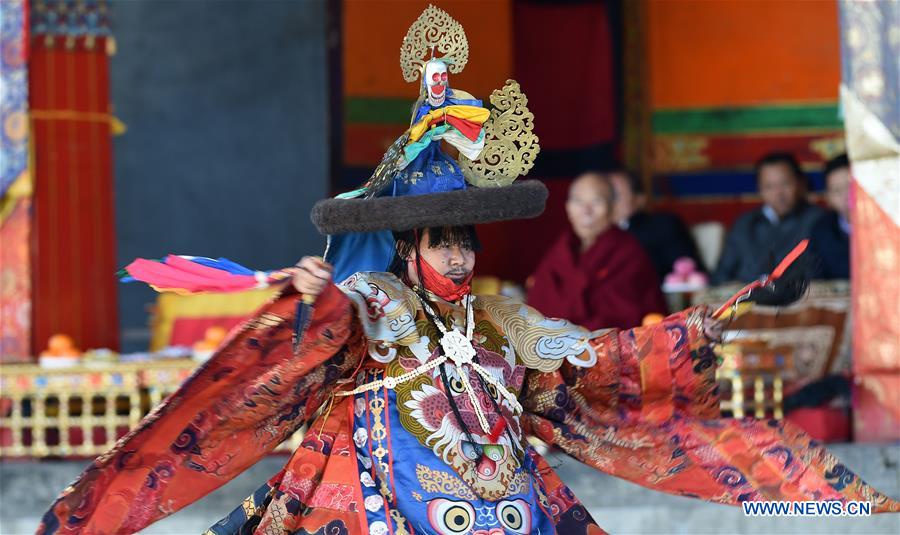 Lamas perform cham dance in China's Tibet