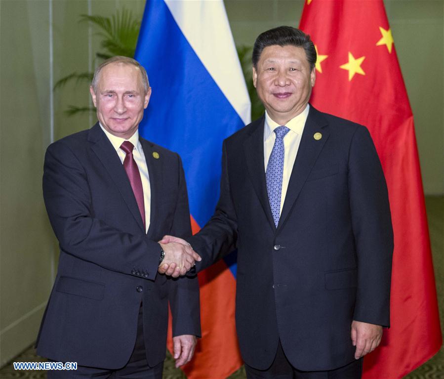 Xi, Putin meet on Asia-Pacific free trade, China-Russia ties
