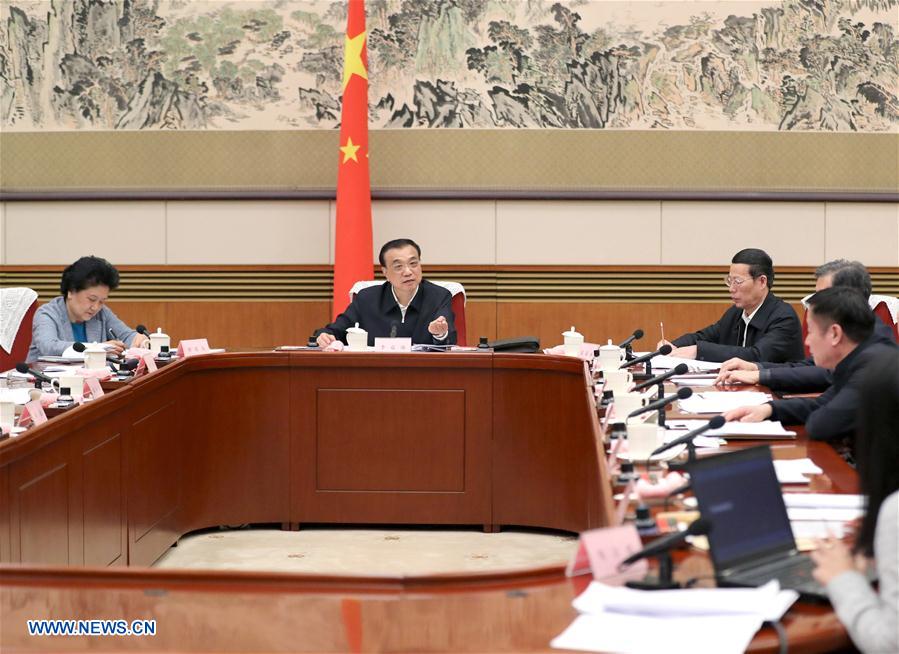 Chinese premier hears opinions on gov't work report