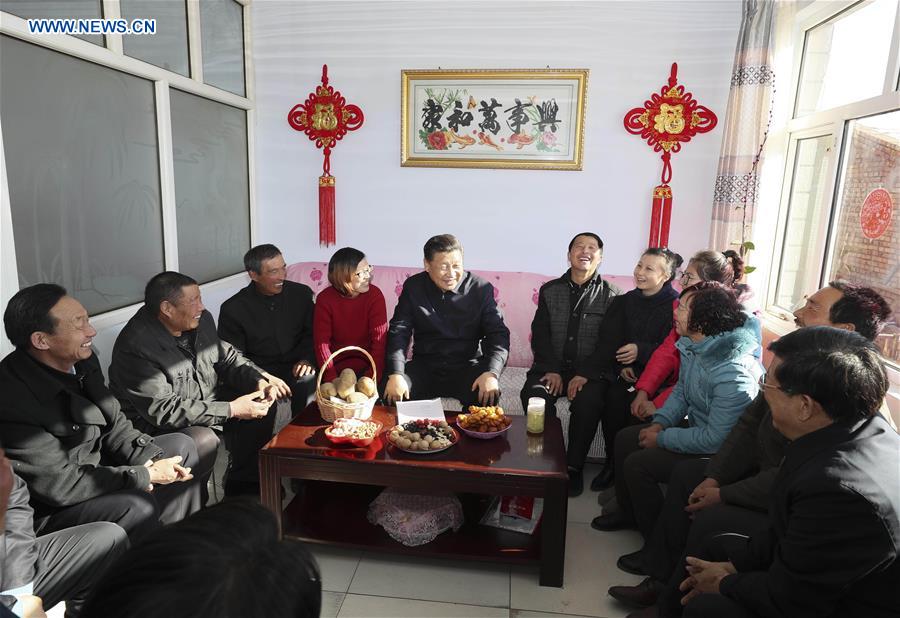 Xi pushes poverty alleviation