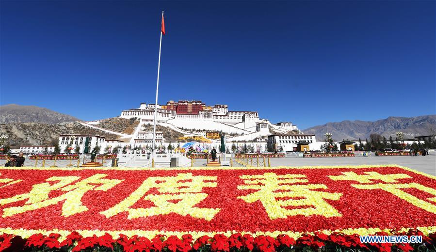 People across China greet upcoming Spring Festival 