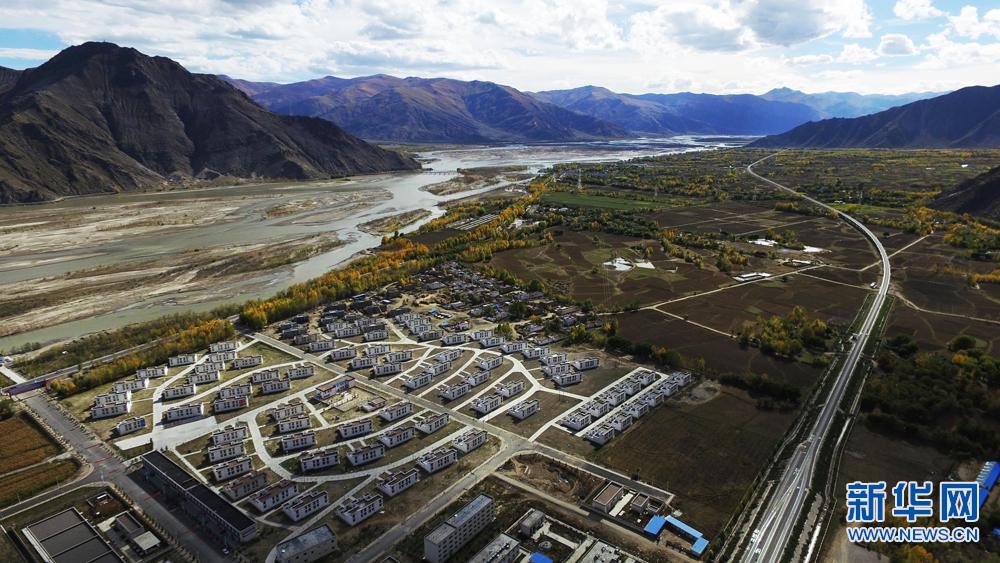 Feature: Tibet's poor build brighter future in new village