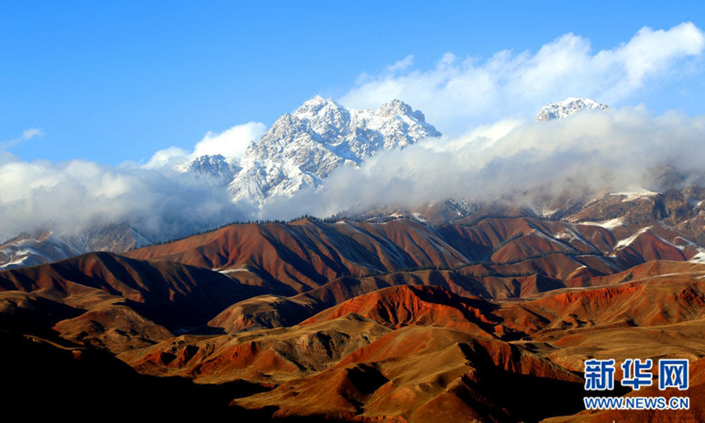 Spring snow adds charm to Qilian Mountain