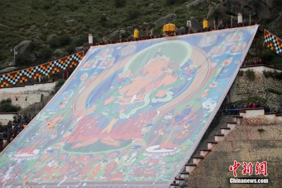 Maitreya thangka painting displayed at Drepung Monastery