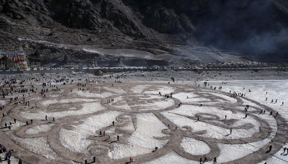 Tibetan Buddhist mantras and symbols made on ice