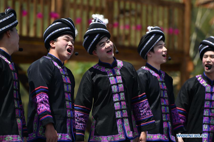 People of Dong ethnic group take part in singing party in China's Hunan 