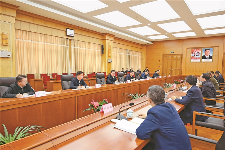 胡昌升会见邱勇一行